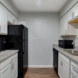 kitchen at The Clara Apartments located in Clarkston, GA