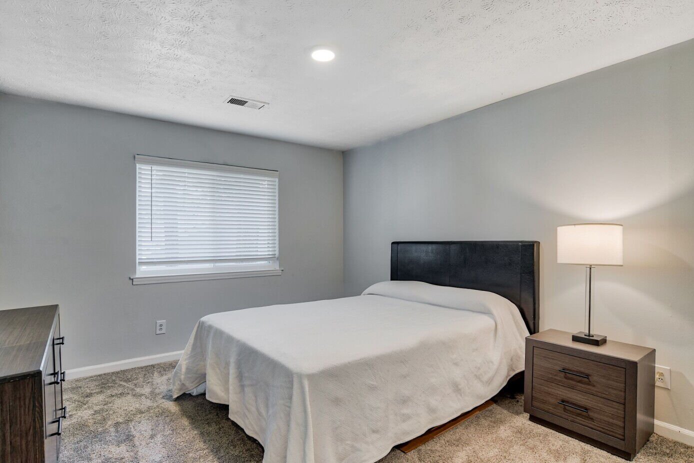 bedroom at The Clara Apartments located in Clarkston, GA