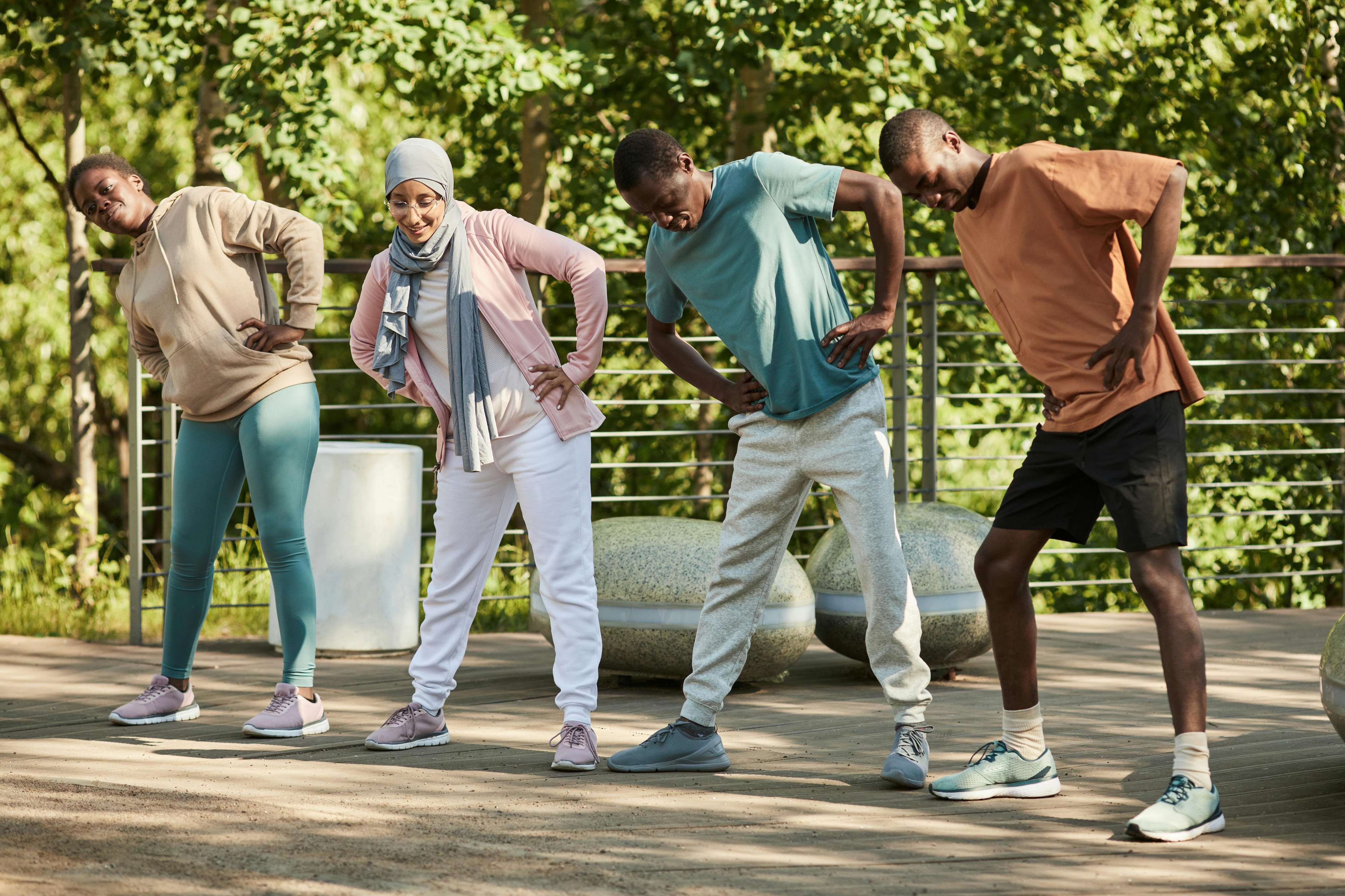 people practicing exercises at The Clara Apartments located in Clarkston, GA